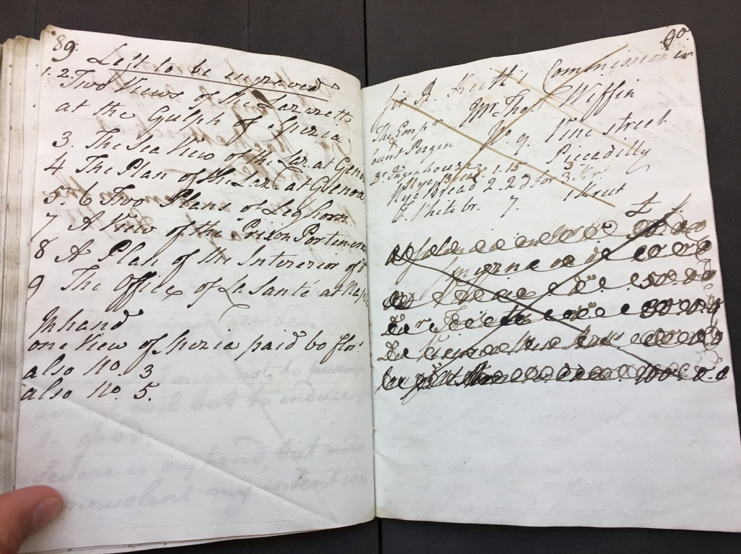 Full page spread of journal with notations scribbled and Xed out